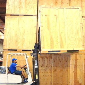 Certified Pro Movers Operating Forklift for Storage