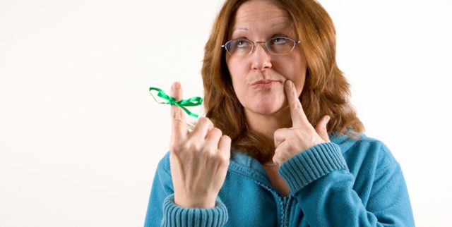 Woman Remembering Top Items for Local Relocation